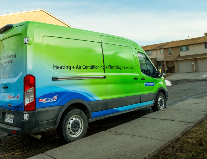 Mr. Furnace service van with HVAC, plumbing, and electrical branding parked in a suburban neighborhood, promoting local trust. Mr. Furnace service van with HVAC, plumbing, and electrical branding parked in a suburban neighborhood, promoting local trust.